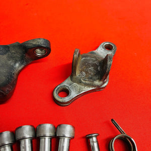 CRF150F FOOT PEG MOUNTS BRACKETS BOLTS GENUINE OEM HONDA CRF 150 F (2003-2009)