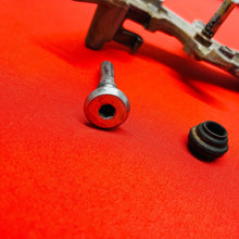 Load image into Gallery viewer, CRF450R REAR BRAKE CALIPER MOUNT BRACKET GENUINE OEM HONDA CRF 450 R (05-08)