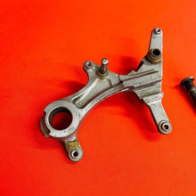 Load image into Gallery viewer, KX250F REAR CALIPER MOUNT BRACKET GENUINE OEM KAWASAKI KX 250 F RMZ (06-18)