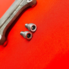 Load image into Gallery viewer, KX85 REAR BRAKE CALIPER MOUNT BRACKET OEM GENUINE KAWASAKI KX 85 100 (2001-2022)