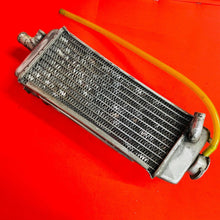 Load image into Gallery viewer, RM125 RIGHT RADIATOR FILL SIDE GENUINE OEM SUZUKI RM 125 (01-08)