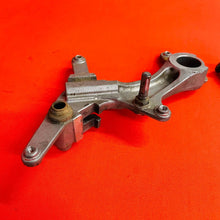 Load image into Gallery viewer, KX250F REAR CALIPER MOUNT BRACKET GENUINE OEM KAWASAKI KX 250 F RMZ (06-18)