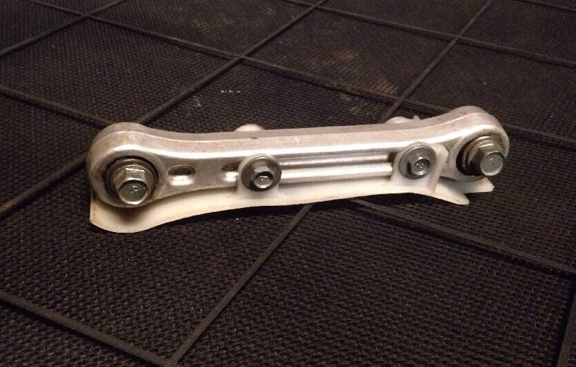 99 OEM KX60 RM60 RM 60 REAR SHOCK LINKAGE ARM PIVOT BACK SUSPENSION ROCKER