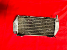 Load image into Gallery viewer, (01-07) RM125 RADIATOR LEFT NON FILL SIDE RAD OEM SUZUKI RM 125