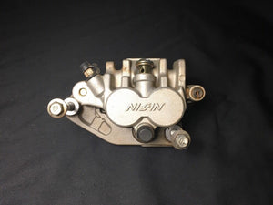 07 RM125 SUZUKI RM 125 OEM COMPLETE NISIN FRONT BRAKE CALIPER WITH PADS